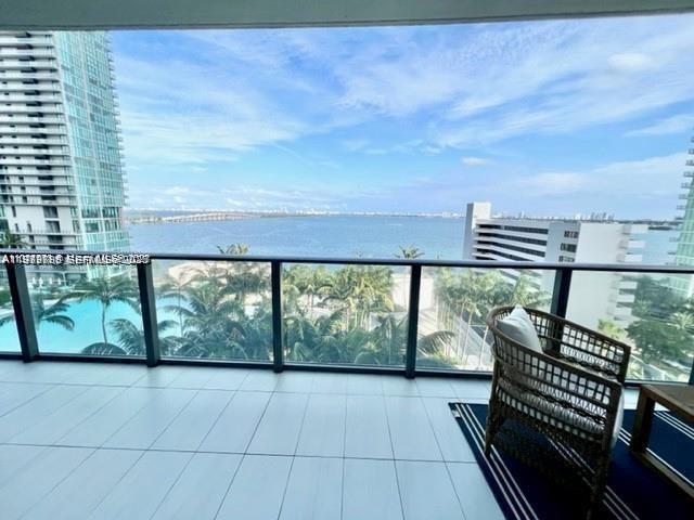 480 Northeast 31st Street, Unit 902 Miami, FL 33137 - Photo 2 of 33 a view of a floor to ceiling window next to a yard