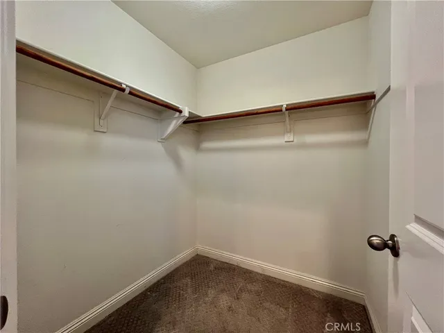 a bathroom with a shower sink and mirror