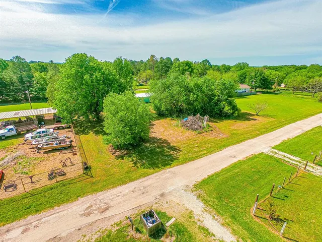 a view of a lake with a big yard