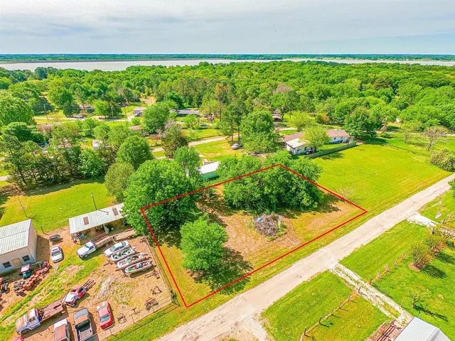 a view of a yard with an outdoor seating