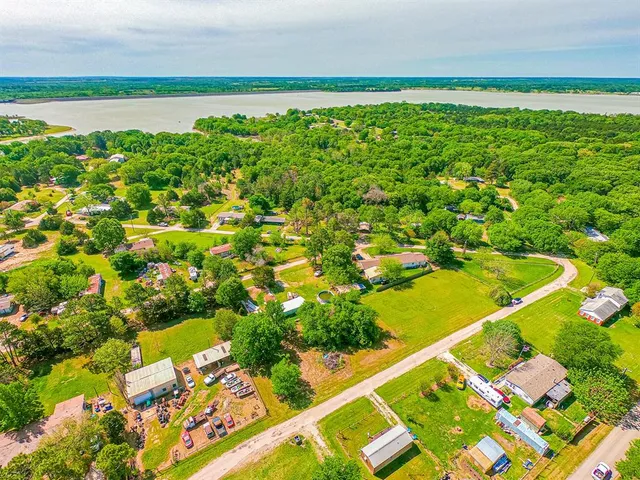 a view of a yard with an outdoor seating