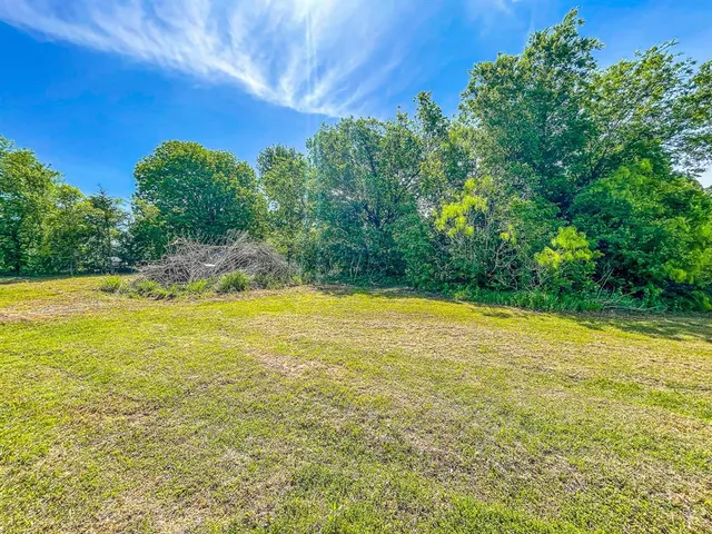 a view of an outdoor space and swimming pool