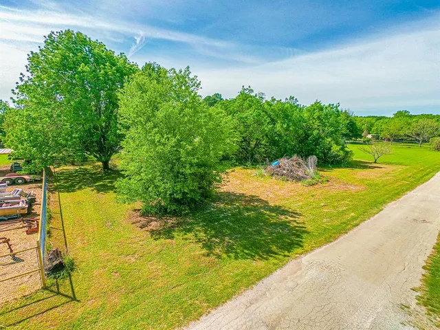 a view of a lake with a big yard
