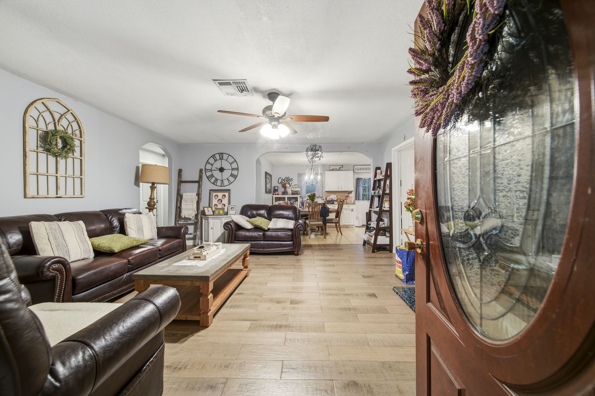731 Meneley Road Winnie, TX 77665 - Photo 3 of 27 a living room with furniture a rug and a large window