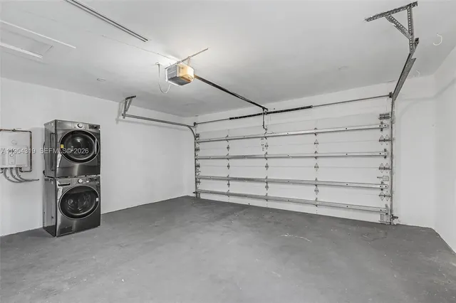 a view of a storage & utility room with washer and dryer