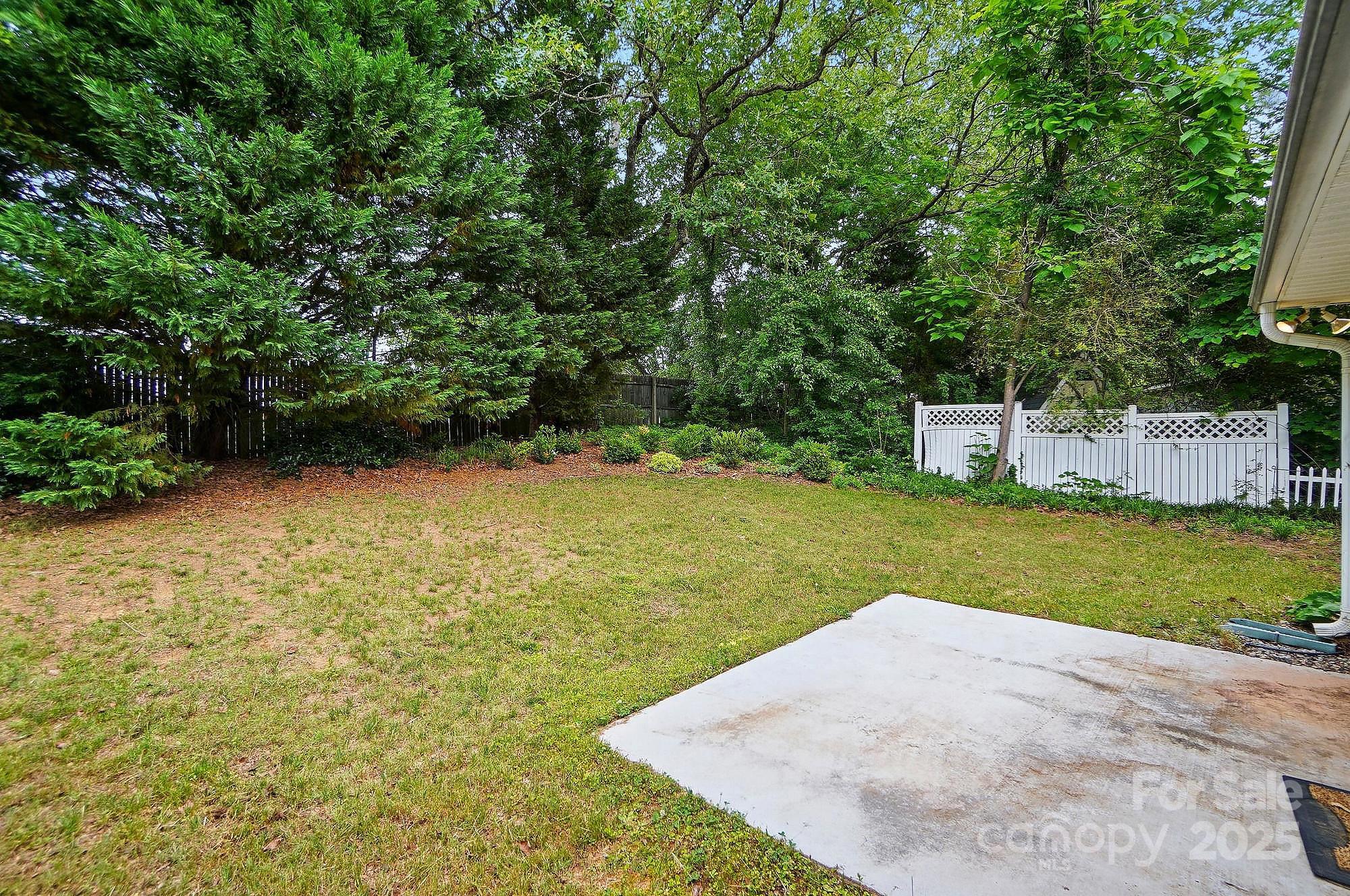 519 Jacobs Ridge Fort Mill, SC 29715 - Photo 38 of 41 a view of a backyard with large trees