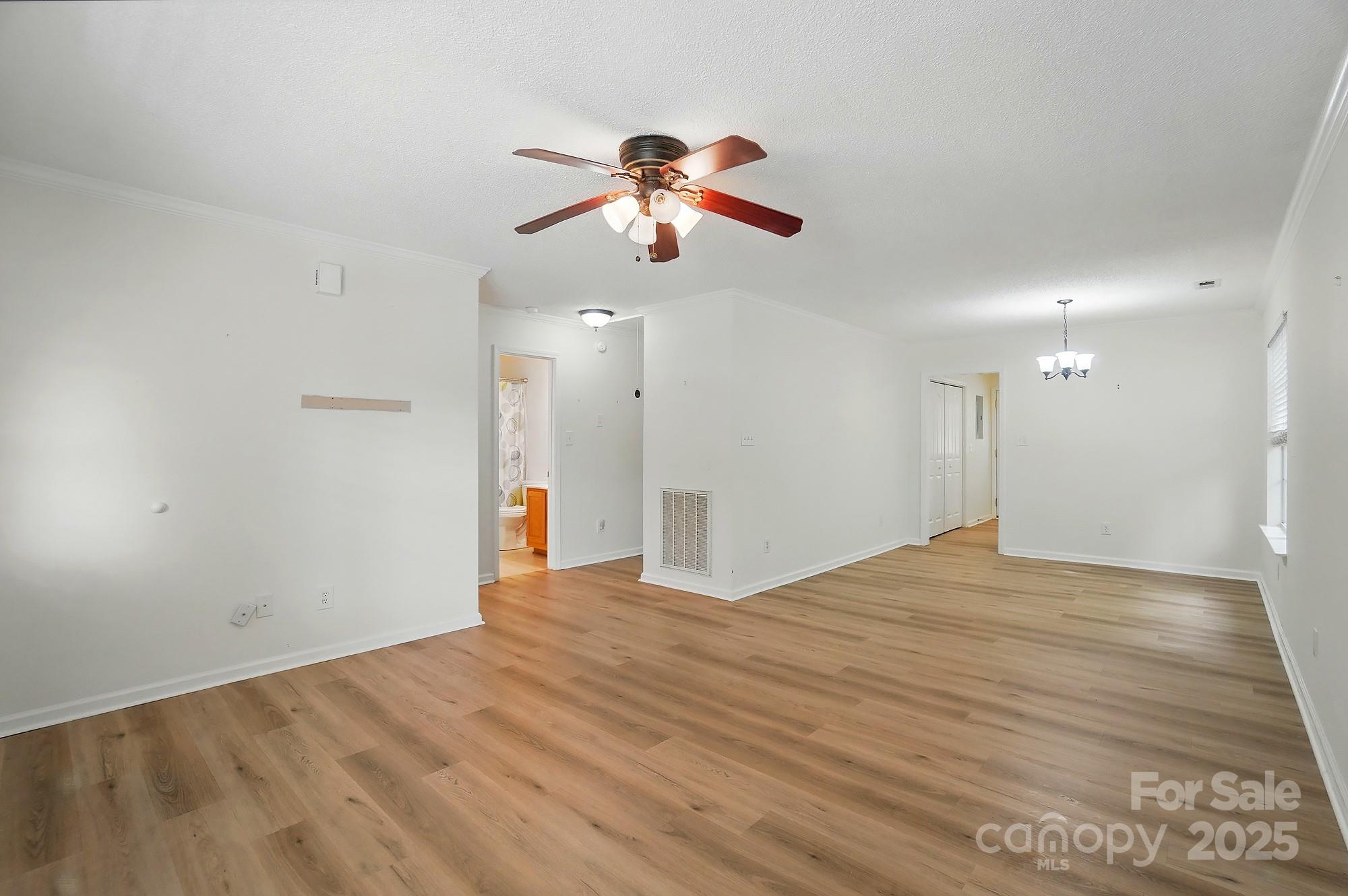519 Jacobs Ridge Fort Mill, SC 29715 - Photo 7 of 41 a view of empty room with wooden floor