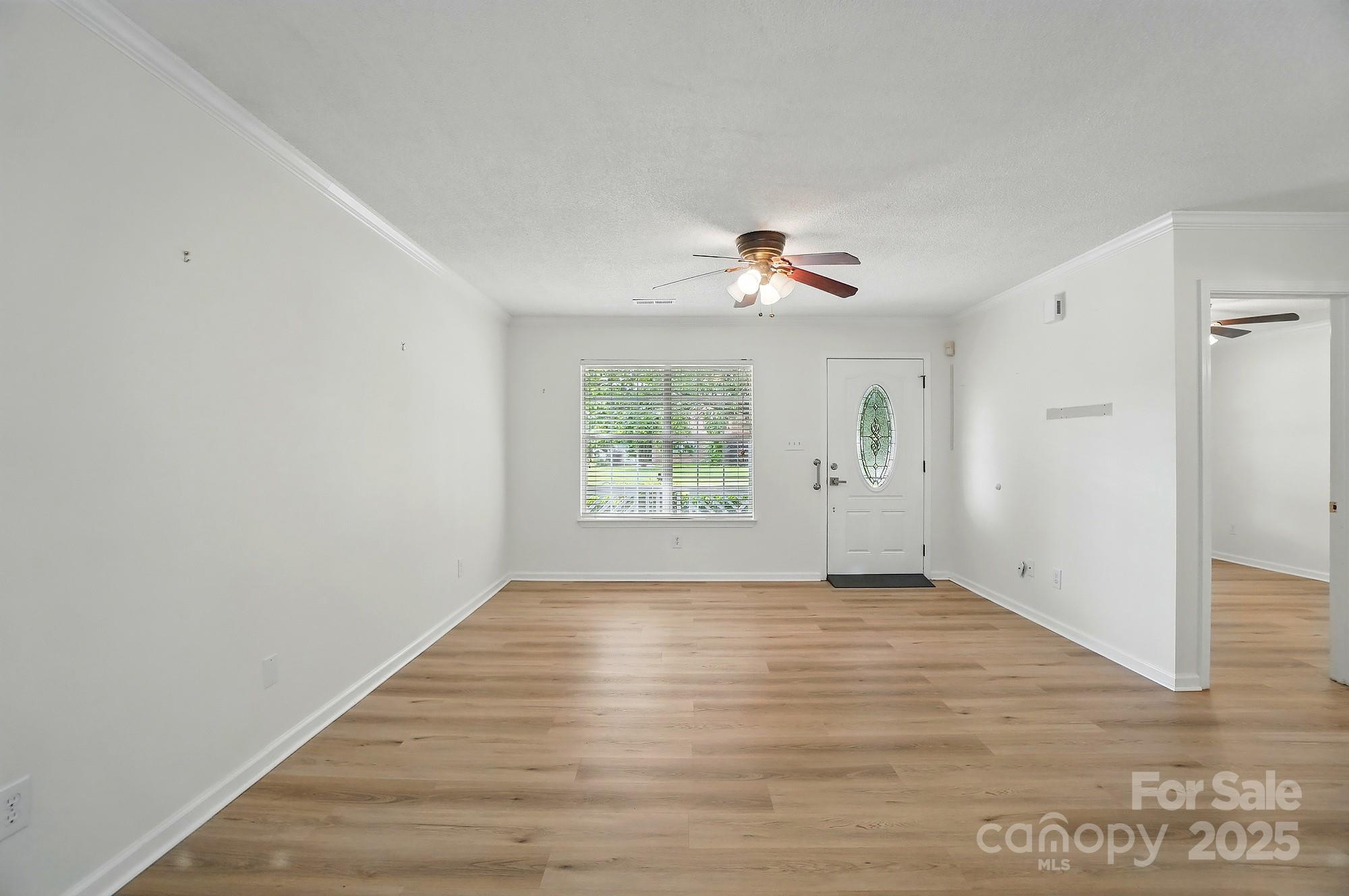 519 Jacobs Ridge Fort Mill, SC 29715 - Photo 8 of 41 a view of an empty room with a window