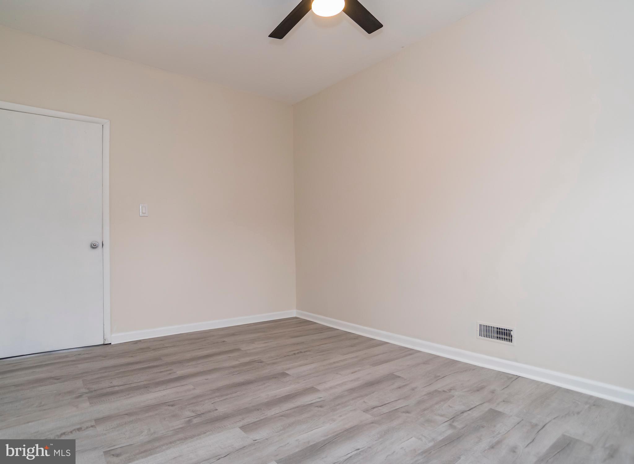 2427 Buttonwood Lane Millville, NJ 08332 - Photo 25 of 58 wooden floor in an empty room