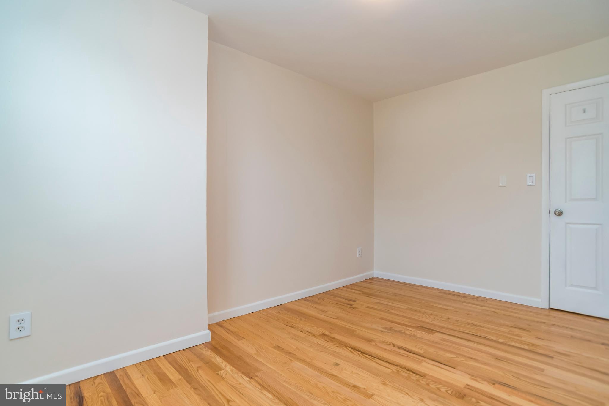 2427 Buttonwood Lane Millville, NJ 08332 - Photo 33 of 58 a view of empty room with wooden floor