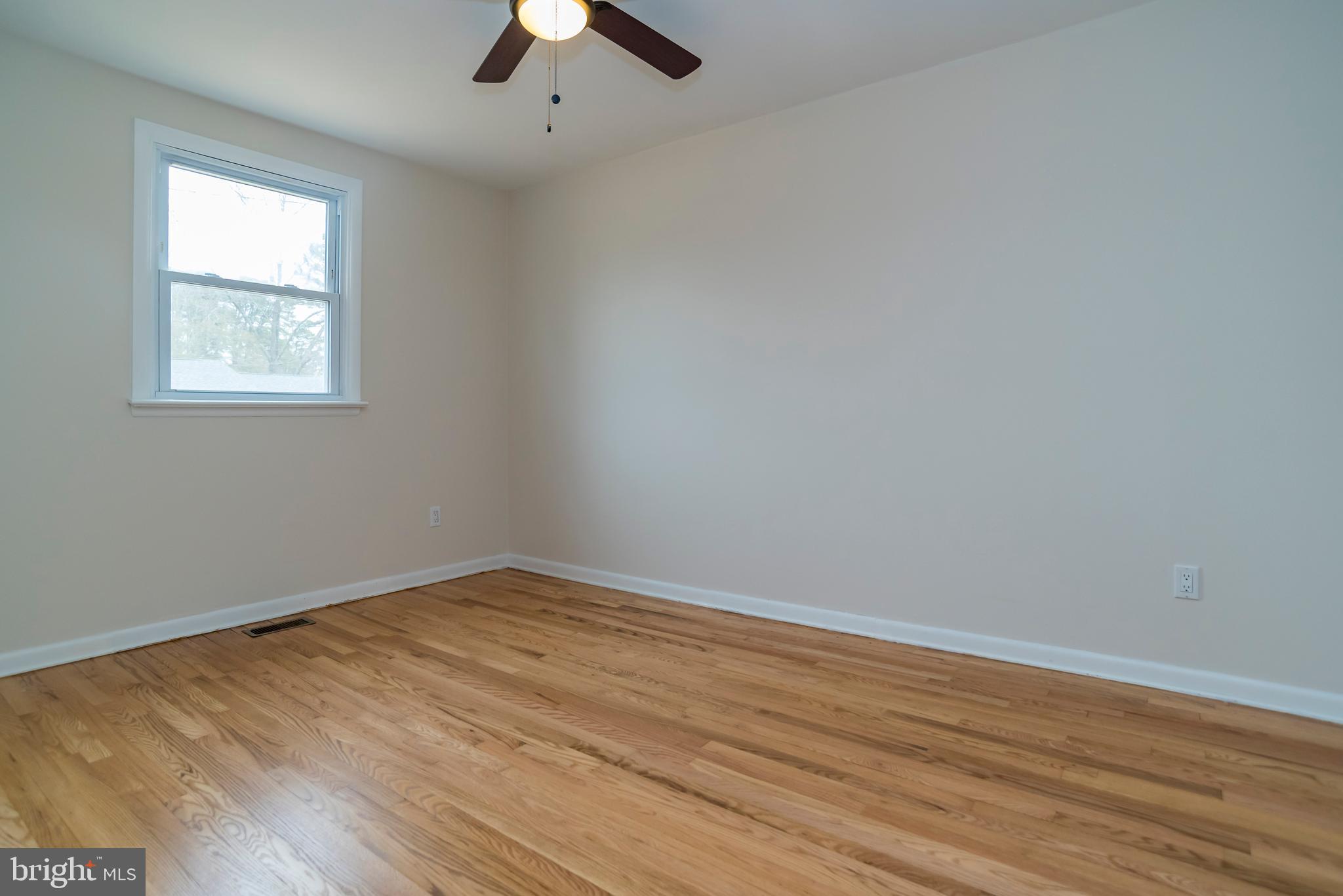 2427 Buttonwood Lane Millville, NJ 08332 - Photo 34 of 58 an empty room with a window