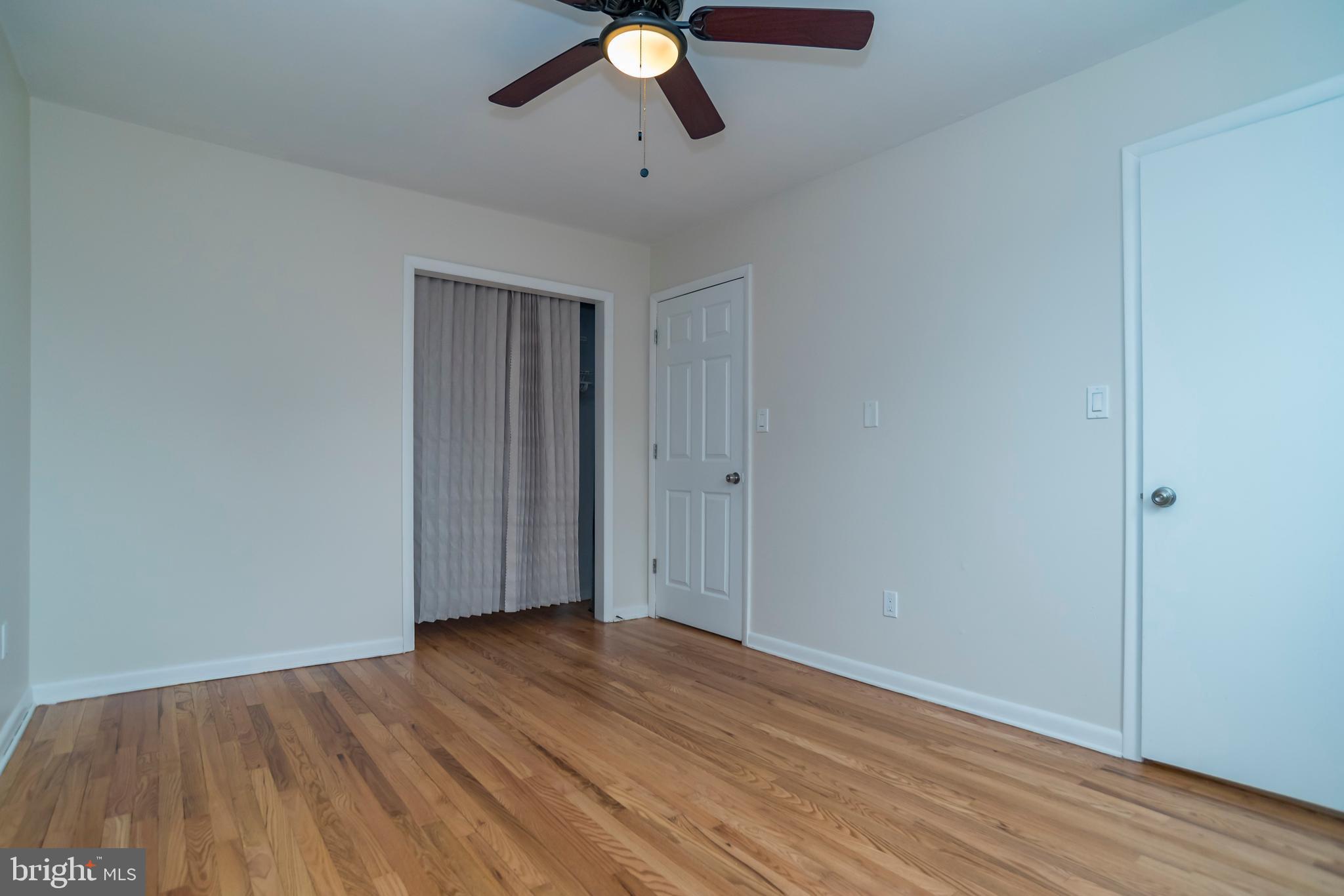 2427 Buttonwood Lane Millville, NJ 08332 - Photo 36 of 58 a view of empty room with wooden floor