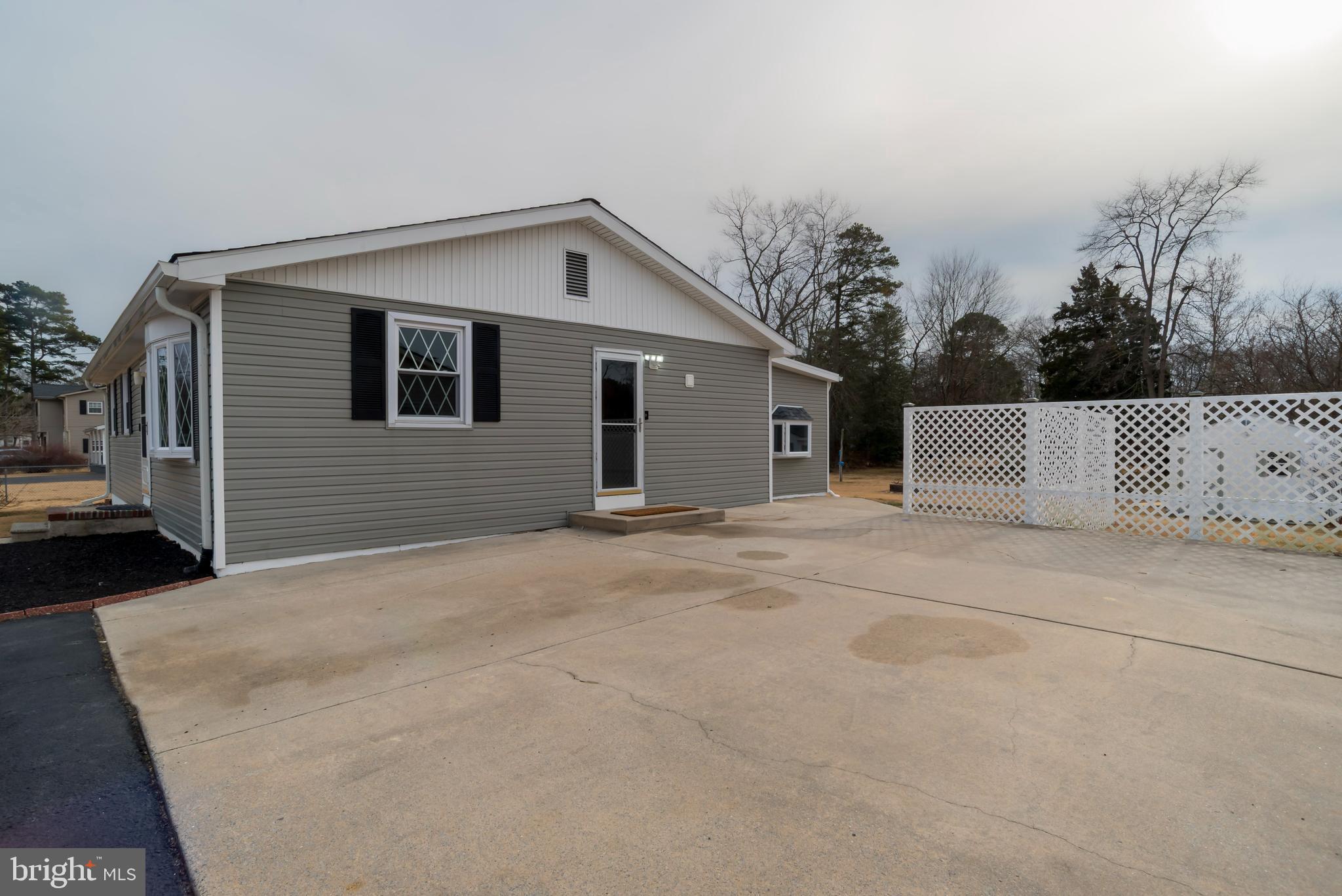 2427 Buttonwood Lane Millville, NJ 08332 - Photo 4 of 58 a view of a house with a yard
