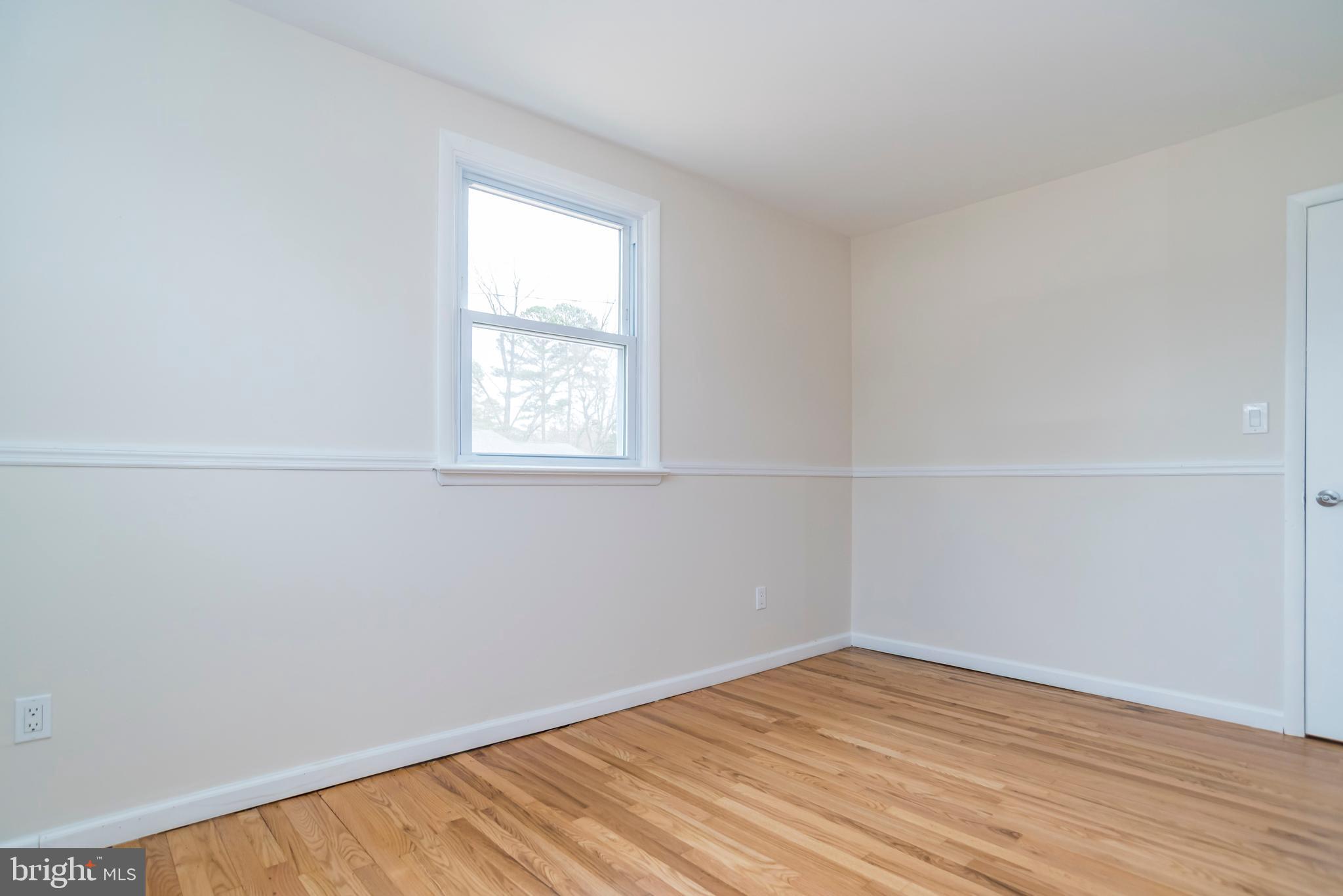 2427 Buttonwood Lane Millville, NJ 08332 - Photo 42 of 58 an empty room with a window