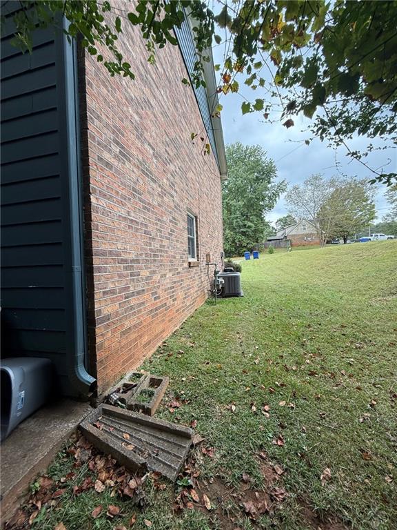 310 Bedford Bay Lane Lawrenceville, GA 30046 - Photo 17 of 23 a backyard of a house with lots of green space