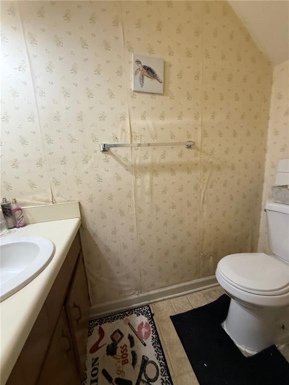 310 Bedford Bay Lane Lawrenceville, GA 30046 - Photo 21 of 23 a bathroom with a sink and a toilet