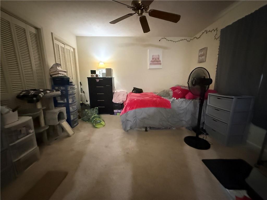 310 Bedford Bay Lane Lawrenceville, GA 30046 - Photo 22 of 23 a bedroom with furniture and a window