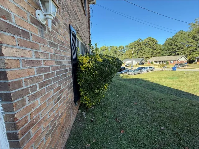 a view of a yard with an outdoor space
