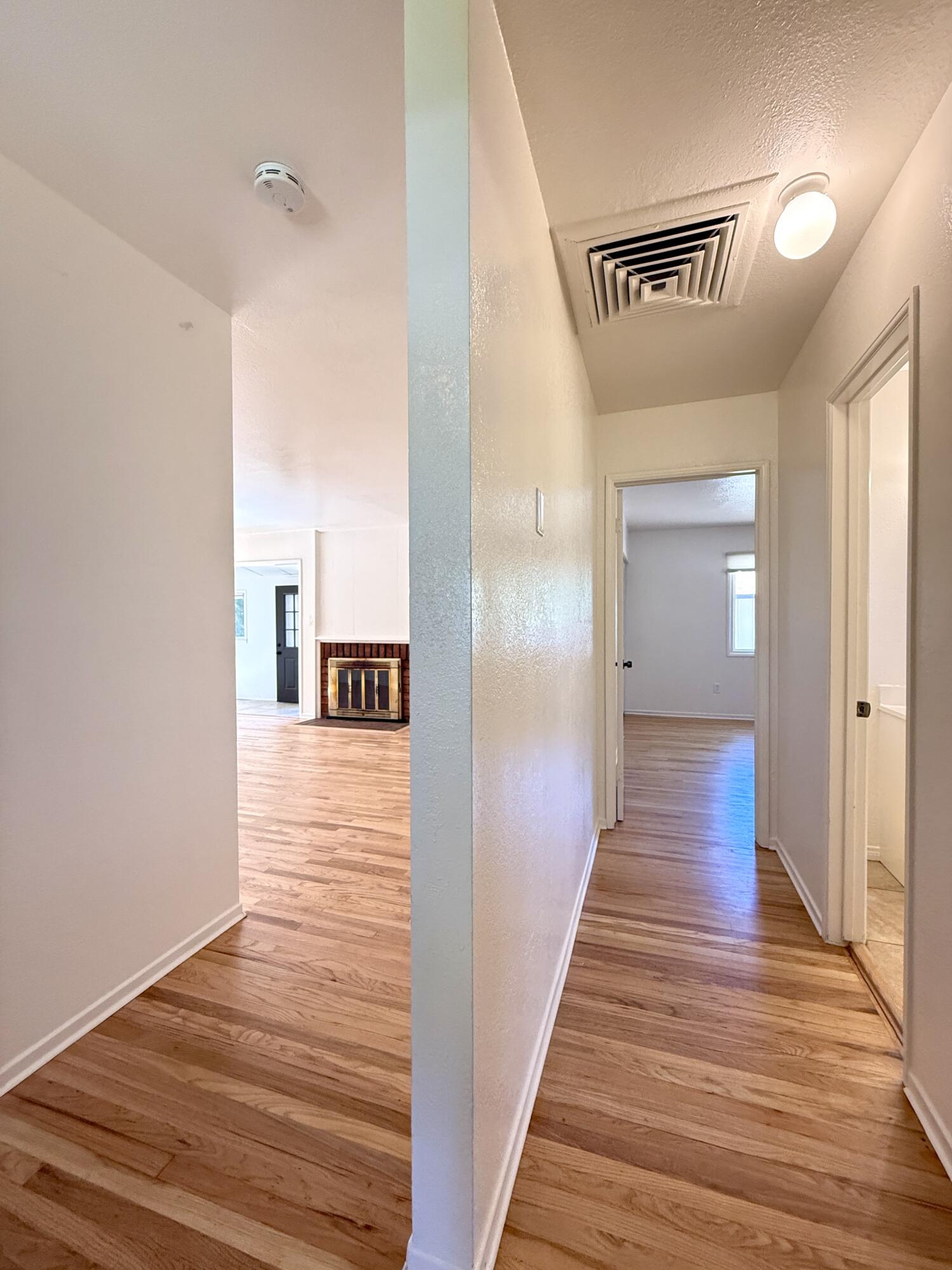 1365 Jenner Street Lancaster, CA 93534 - Photo 40 of 44 Hallway with shot of living room firepla