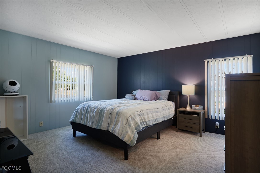 15 Ilex Street Alva, FL 33920 - Photo 15 of 43 a bedroom with a bed and a closet