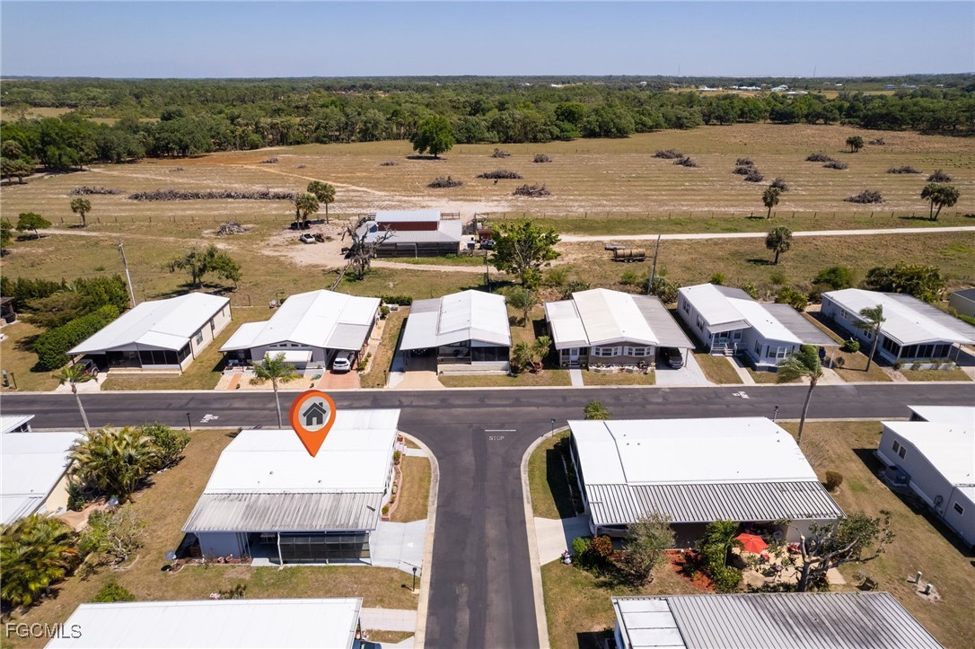 15 Ilex Street Alva, FL 33920 - Photo 30 of 43 an aerial view of a house with outdoor space