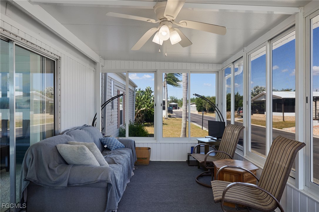 15 Ilex Street Alva, FL 33920 - Photo 3 of 43 a living room with furniture and a large window