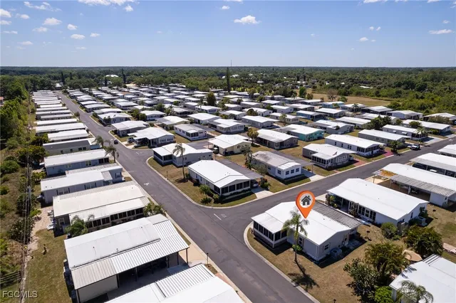 an aerial view of a house with a garden
