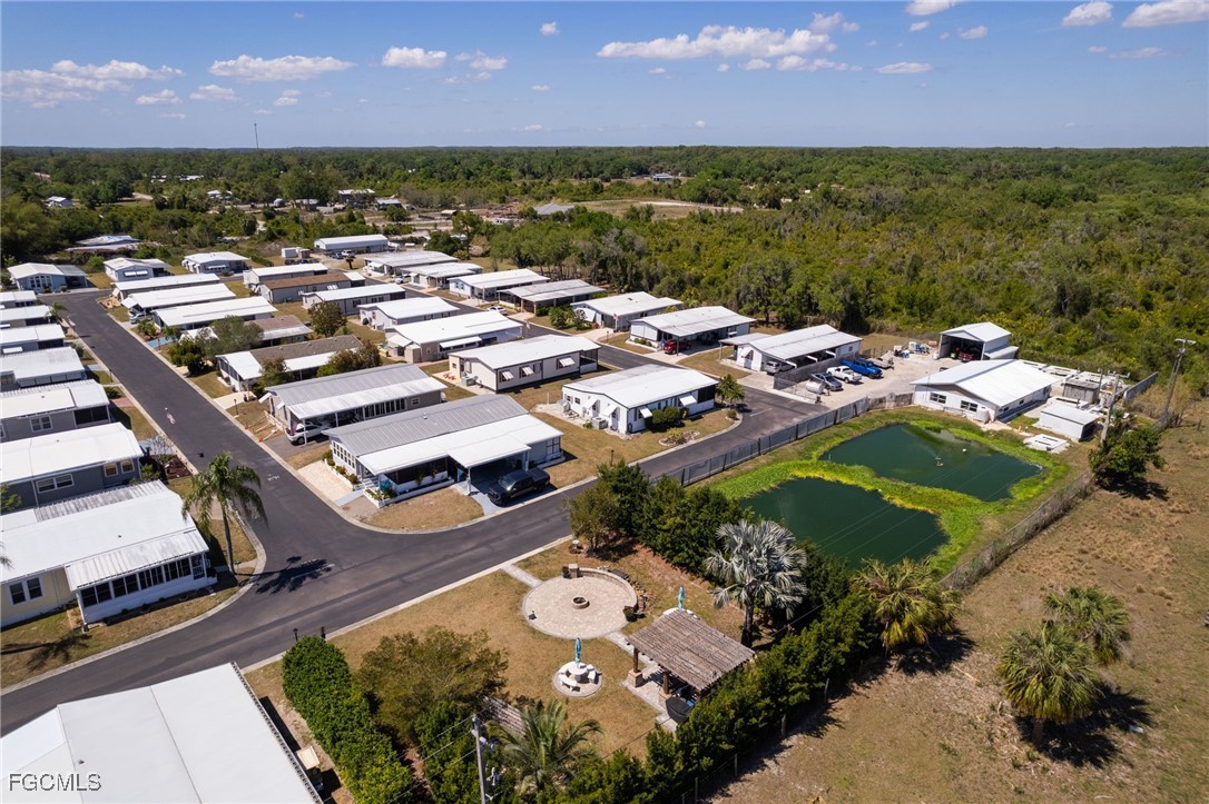 15 Ilex Street Alva, FL 33920 - Photo 35 of 43 an aerial view of a house with a lake view