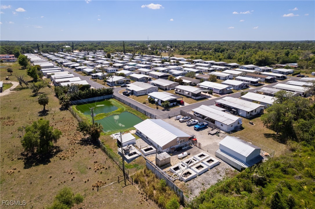 15 Ilex Street Alva, FL 33920 - Photo 36 of 43 an aerial view of a house with a garden