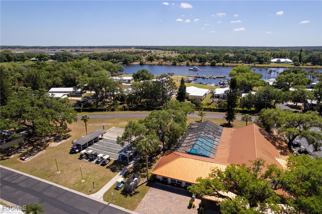 15 Ilex Street Alva, FL 33920 - Photo 37 of 43 an aerial view of a house with a yard