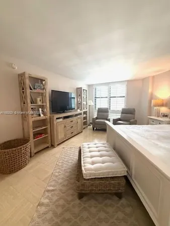 a bathroom with a tub and a shower