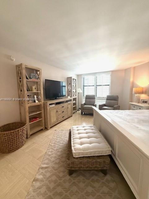 1121 Crandon Boulevard, Unit D702 Key Biscayne, FL 33149 - Photo 16 of 51 a large white kitchen with a large window and stainless steel appliances