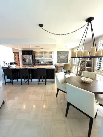 a living room with lots of furniture and window