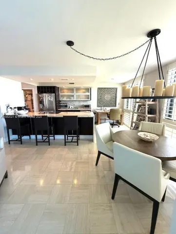 a living room with lots of furniture and window