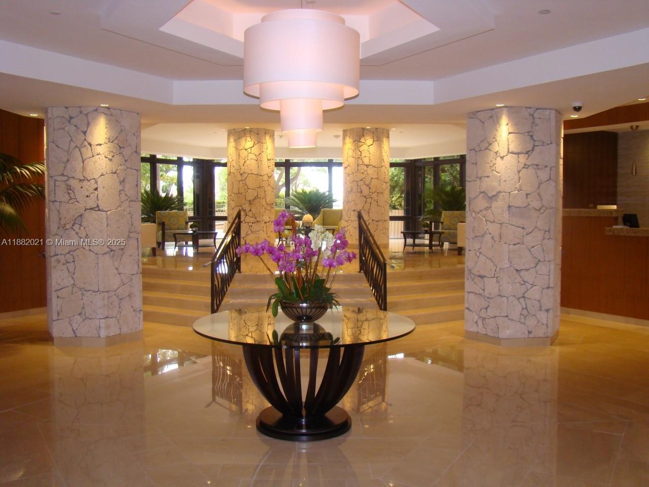 1121 Crandon Boulevard, Unit D702 Key Biscayne, FL 33149 - Photo 28 of 51 a view of a room with gym equipment