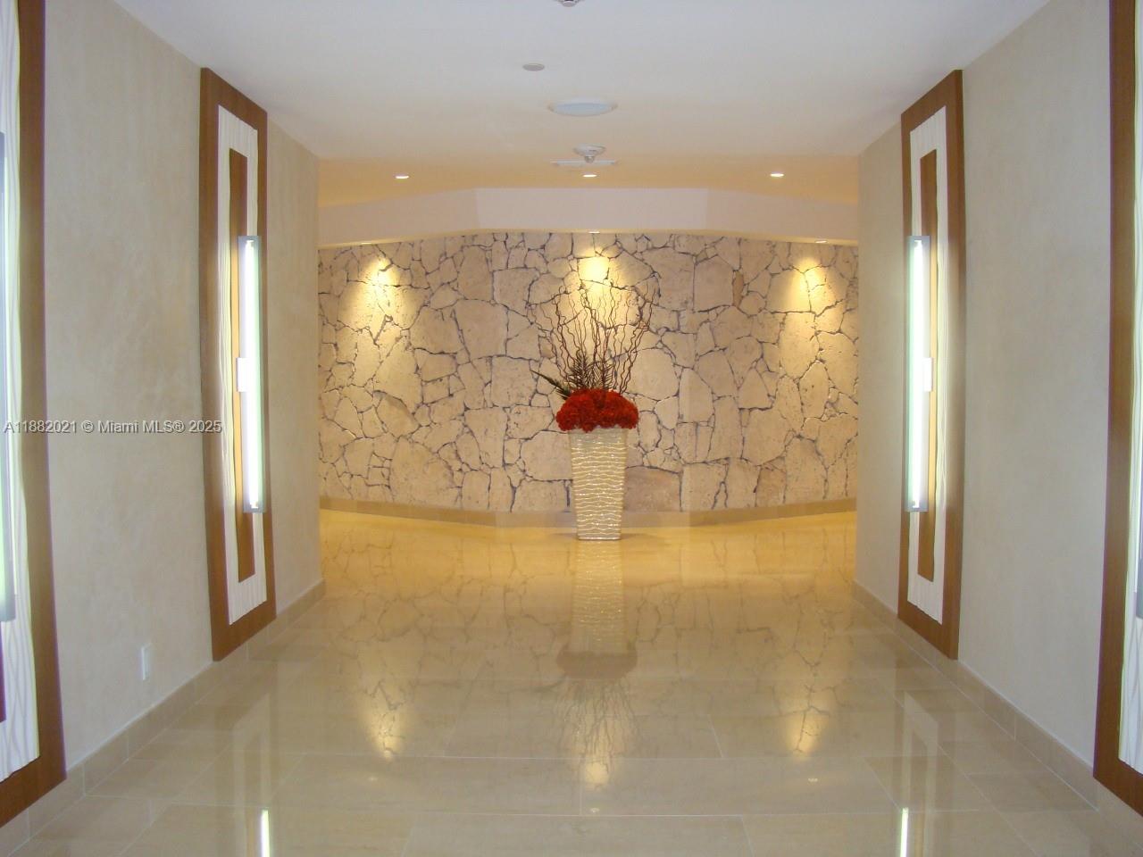 1121 Crandon Boulevard, Unit D702 Key Biscayne, FL 33149 - Photo 29 of 51 a view of a bathroom with a shower