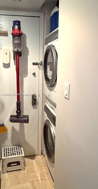 1121 Crandon Boulevard, Unit D702 Key Biscayne, FL 33149 - Photo 30 of 51 a utility room with dryer and washer