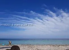 a view of a backyard of a house
