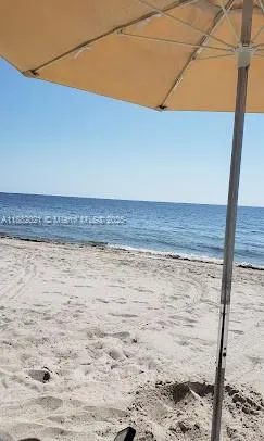 a view of roof with city view