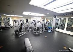 1121 Crandon Boulevard, Unit D702 Key Biscayne, FL 33149 - Photo 44 of 51 a view of a room with gym equipment