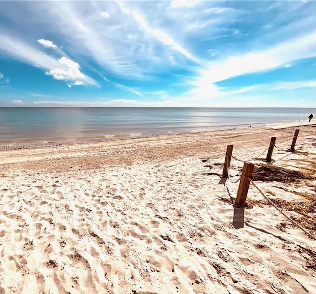 1121 Crandon Boulevard, Unit D702 Key Biscayne, FL 33149 - Photo 46 of 51 a view of an ocean and beach