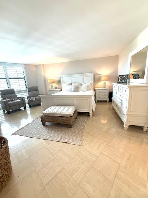 1121 Crandon Boulevard, Unit D702 Key Biscayne, FL 33149 - Photo 9 of 51 a living room with furniture and a couch