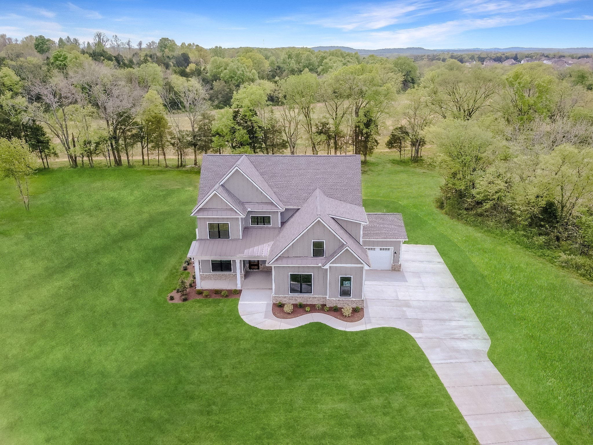 7004 Twelve Corners Road Lascassas, TN 37085 - Photo 11 of 67 an aerial view of a house with a big yard