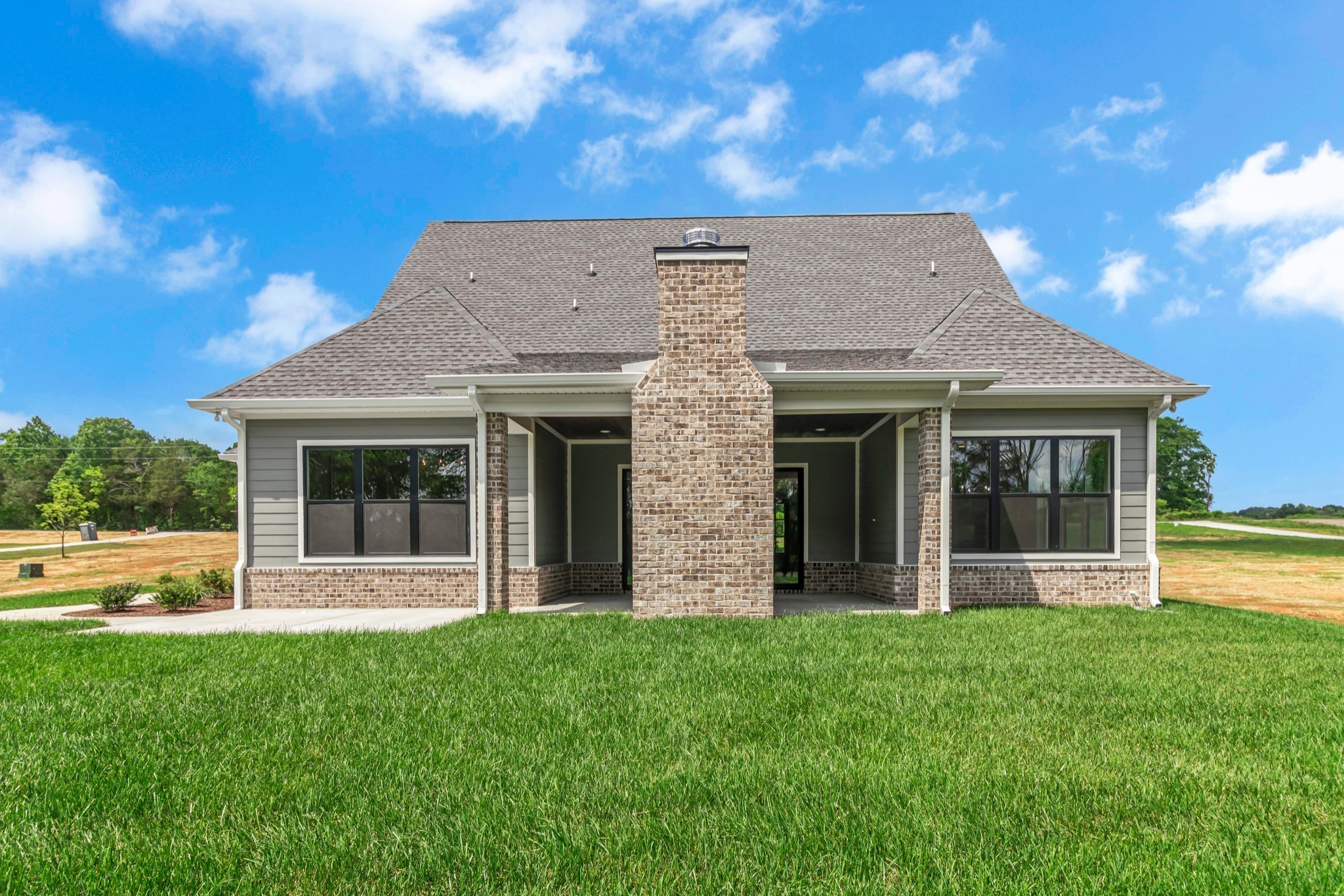 7004 Twelve Corners Road Lascassas, TN 37085 - Photo 16 of 67 a view of a house with garden and yard