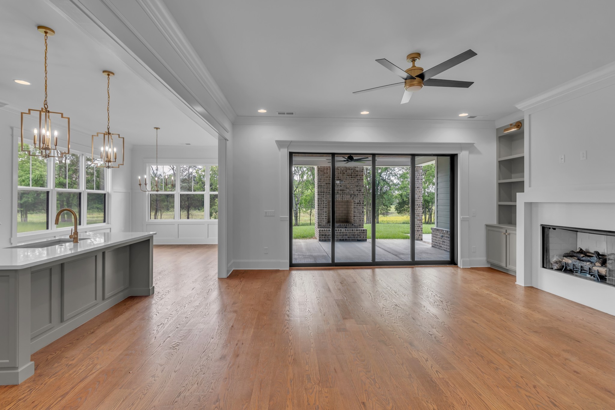 7004 Twelve Corners Road Lascassas, TN 37085 - Photo 36 of 67 a view of an empty room with wooden floor and a window