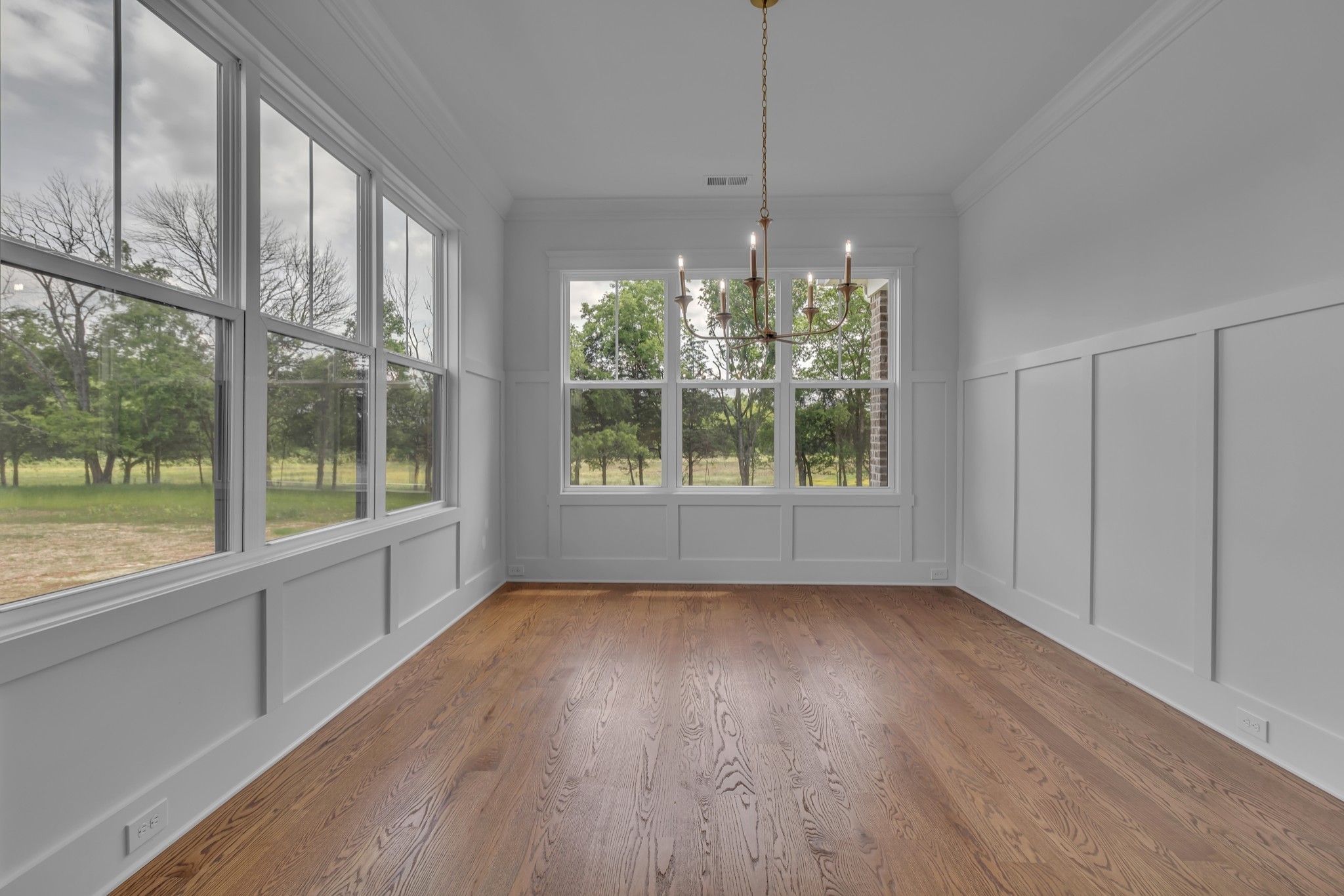 7004 Twelve Corners Road Lascassas, TN 37085 - Photo 47 of 67 a view of an empty room with a window and wooden floor