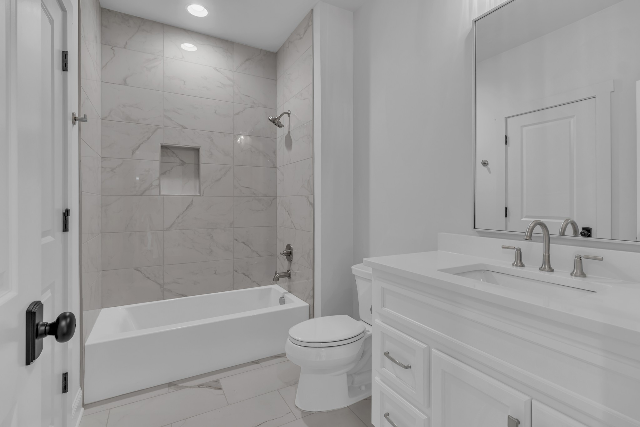 7004 Twelve Corners Road Lascassas, TN 37085 - Photo 62 of 67 a bathroom with a toilet a sink and a bathtub