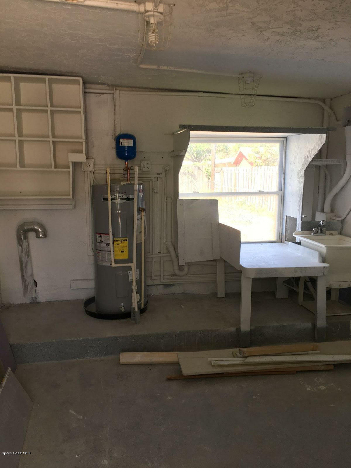 157 St George Road West Melbourne, FL 32904 - Photo 14 of 16 Laundry Room
