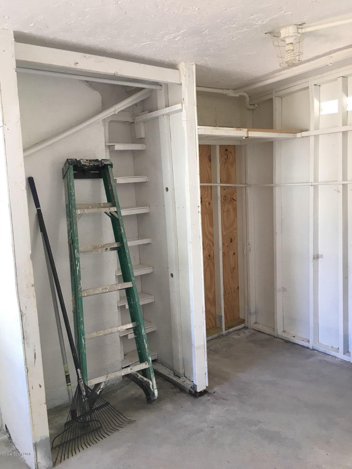 157 St George Road West Melbourne, FL 32904 - Photo 15 of 16 Storage in Laundry
