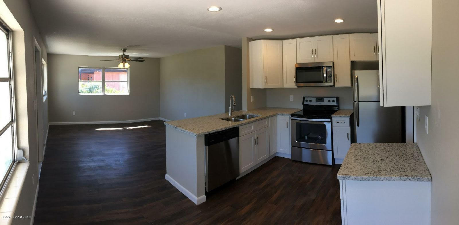 157 St George Road West Melbourne, FL 32904 - Photo 3 of 16 Living Dining Kitchen